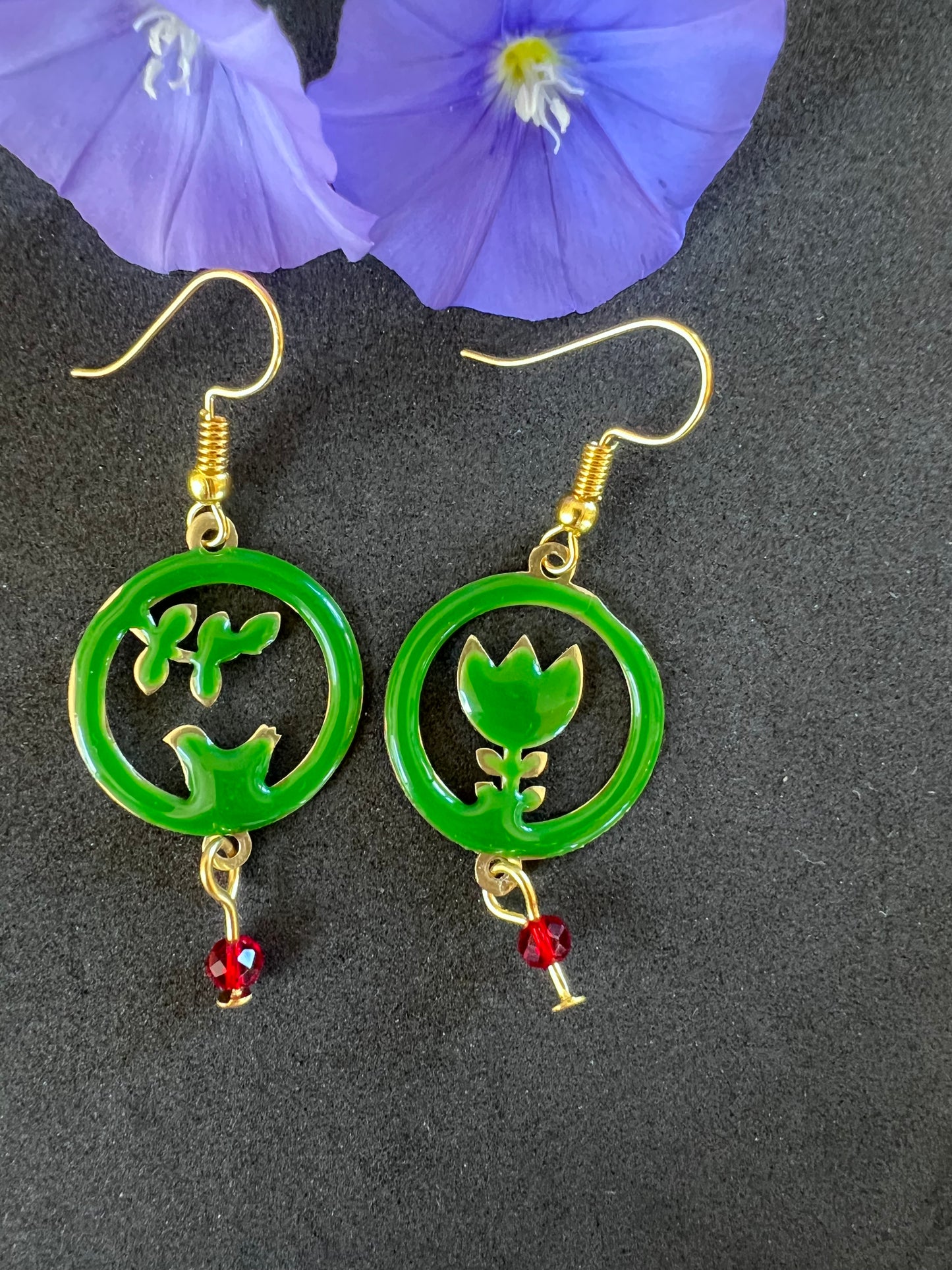 Bird and protea mismatched earrings