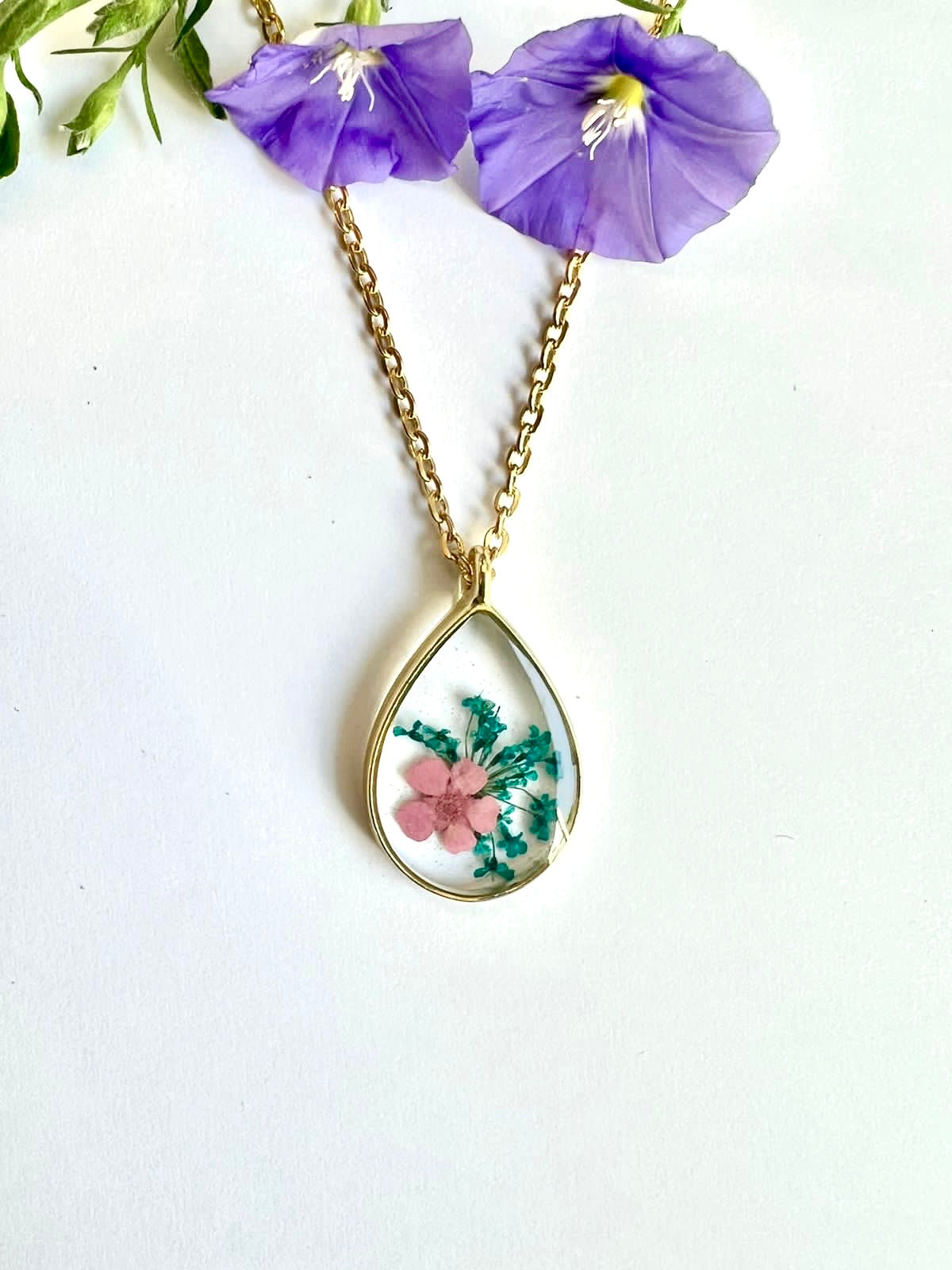tear drop gold frame with tiny real blue and pink flowers necklace gift birthday anniversary