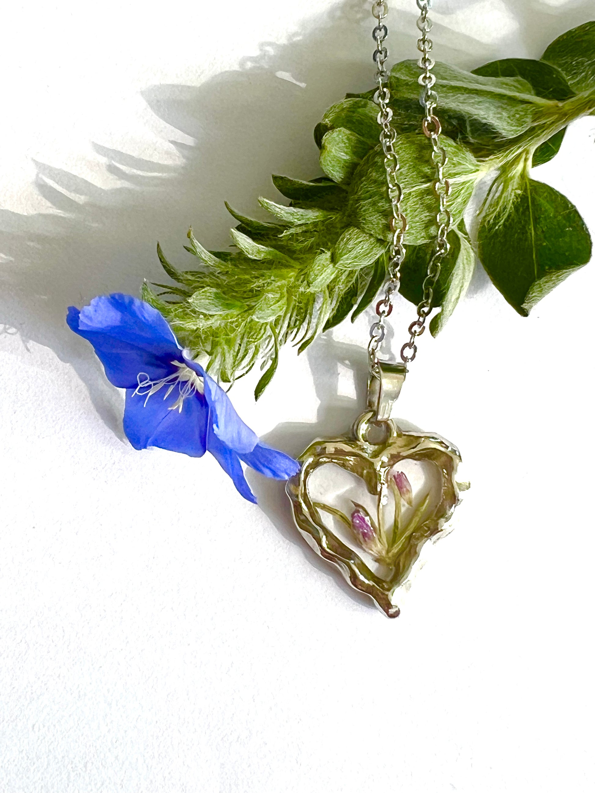 Dainty silver heart shape necklace with yellow and purple wild flower fynbos of Cederberg minimalist perfect gift