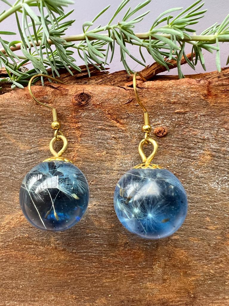 Tiny real dandelion dream earrings in blue ball