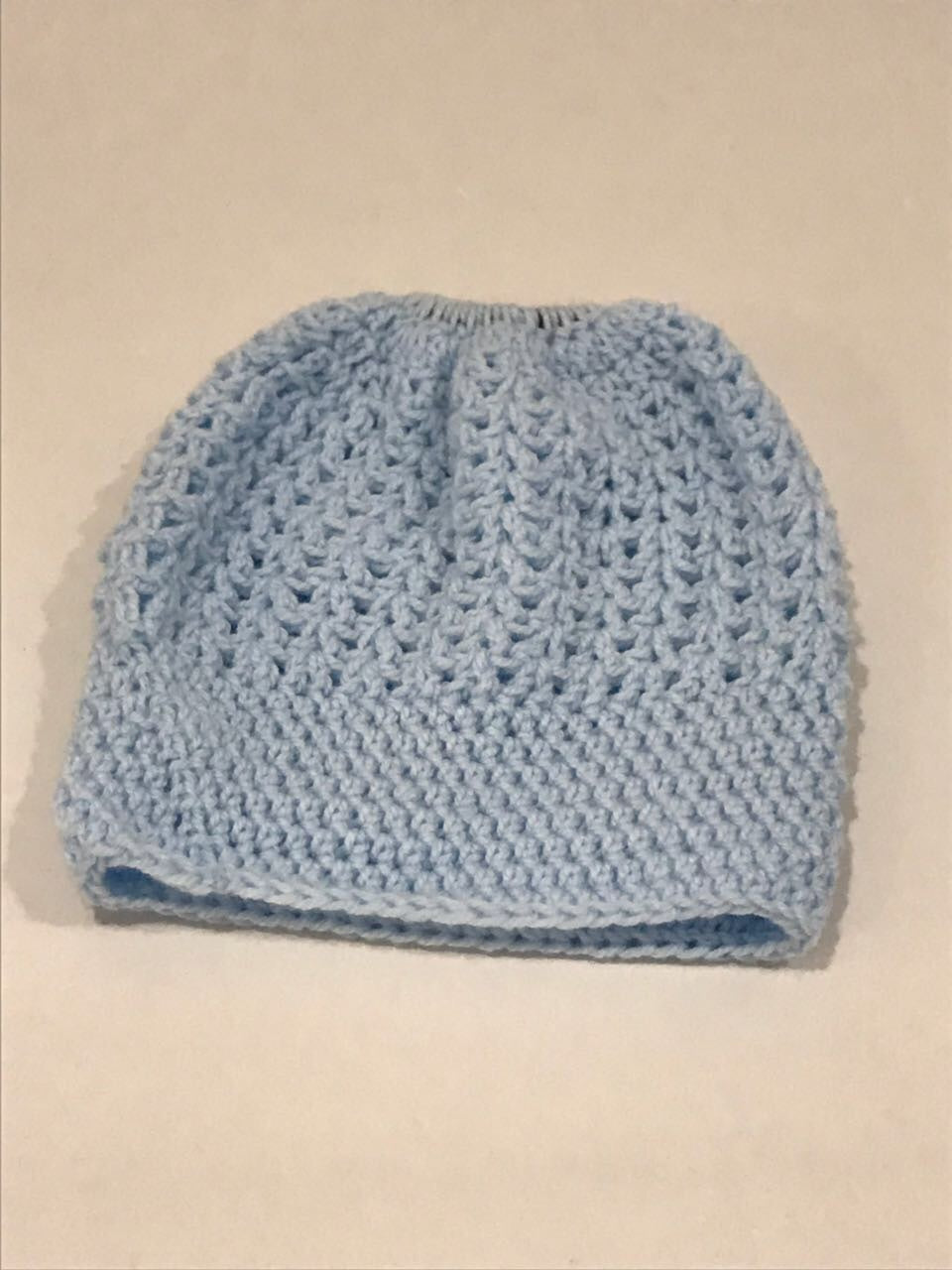 Hand knitted beanie with pony tale hole and boot cuffs - JewlOn