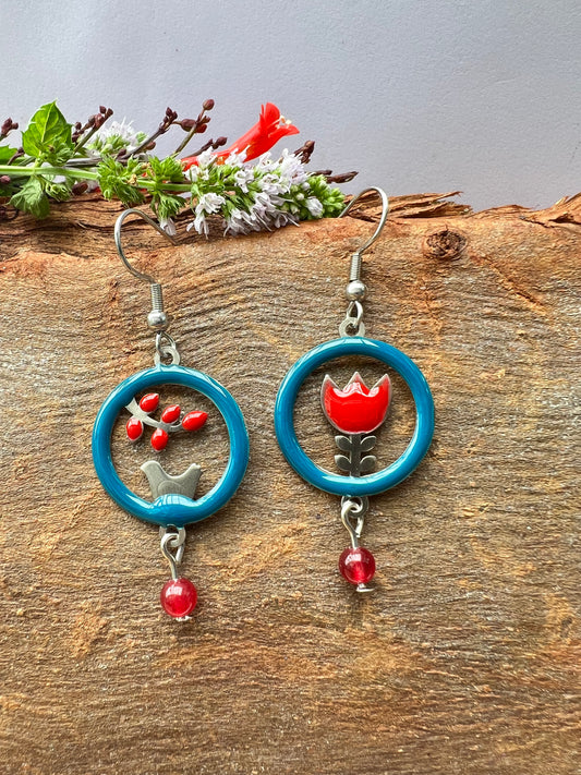 Bird and protea mismatched earrings