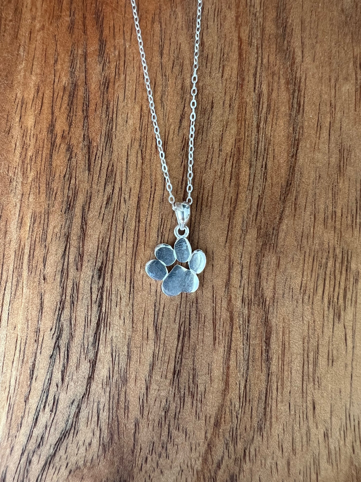 Sterling silver paw print